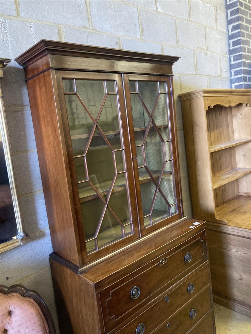 A George III Sheraton style mahogany secretaire bookcase, width 91cm, depth 46cm, height 208cm